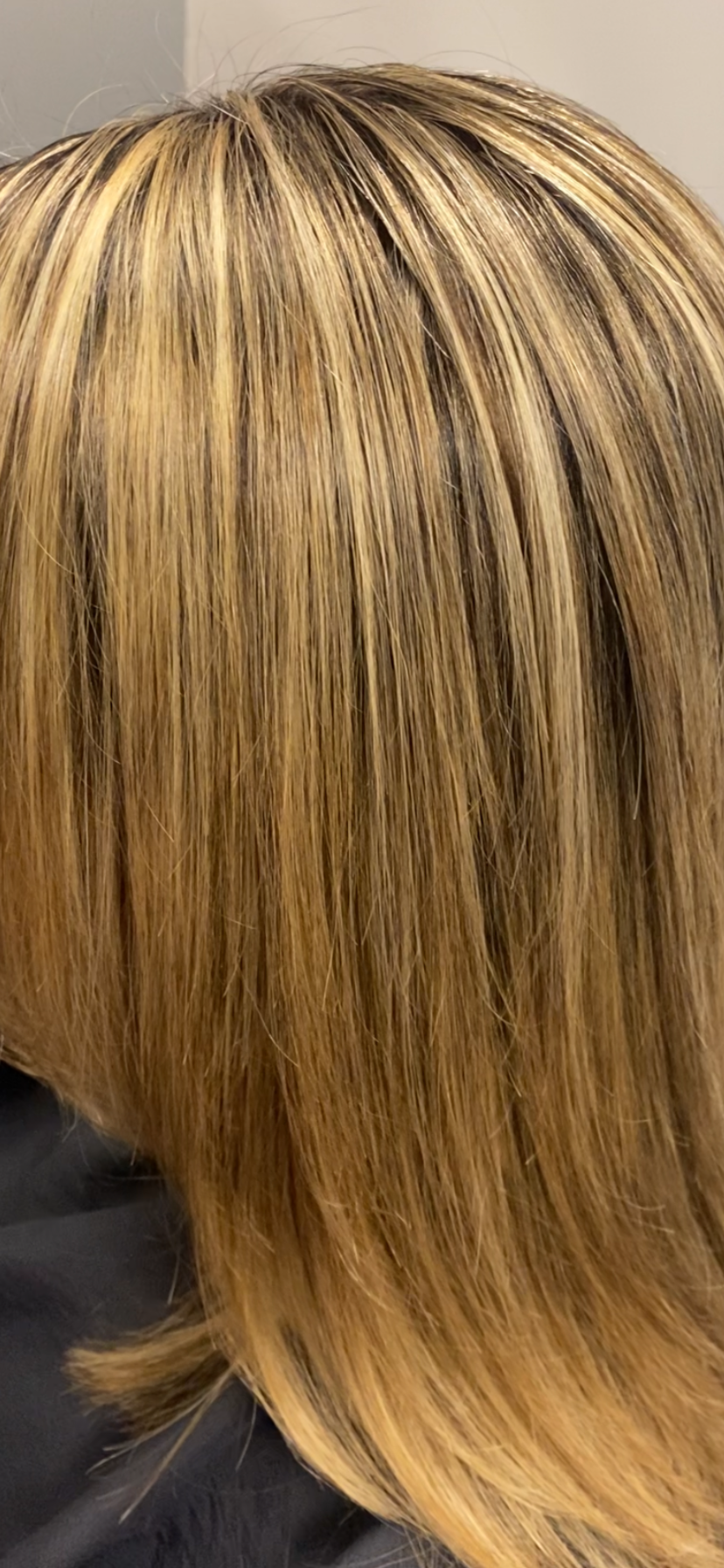 High-contrast bright blonde highlights on warm base