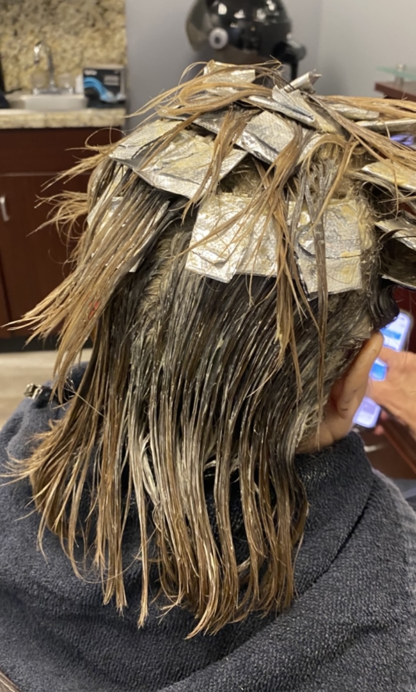 Precision foil placement during highlighting service